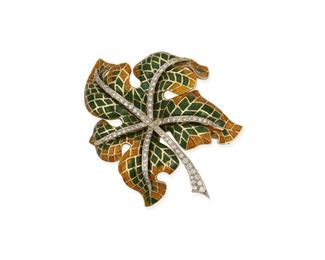 155
An Enamel And Diamond Leaf Brooch
18k yellow gold; Scratched: 750
Set with eighty-one round full-cut diamonds totaling approximately 1.50cts. in weight and graded L-M (light brown) in color and SI clarity and surrounded by multicolored enamel
2.125" W x 1.75" H
30.3 grams
Estimate: $1,200 - $1,800