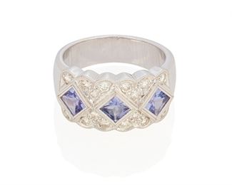 160
A Tanzanite And Diamond Ring
Platinum; Stamped: Pt900
Comprising three fancy square mixed-cut tanzanites each gauged at 4mm x 4mm x 2.5mm surrounded by sixteen round full-cut diamonds totaling approximately 0.50ct. in weight and graded G-H color and SI clarity and finished with a scalloped border (ring size: 7.5 grams)
0.375" H
12.1 grams
Estimate: $600 - $800