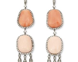 165
A Pair Of Coral And Diamond Chandelier Ear Pendants
18k black gold; Stamped: 18k / 750
Featuring four coral stones largest gauged at 17mm x 12mm surrounded by one hundred ninety-eight round full-cut diamonds totaling 3.06cts. in weight and each graded light gray and light brown in color with SI1-I1 clarity
0.625" W x 3.125" H
22.7 grams
2 pieces
Estimate: $2,500 - $3,500