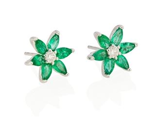 168
A Pair Of Emerald And Diamond Flower Earrings
Platinum and 18k white gold; Earrings stamped: PT950; Backings stamped; 18k
Set with two round full-cut diamonds totaling 0.26ct. in weight and graded H-I color and SI clarity further surrounded by twelve pear shaped emeralds weighing 2.06cts.
0.50" Dia
5.3 grams
2 pieces
Estimate: $1,800 - $2,500