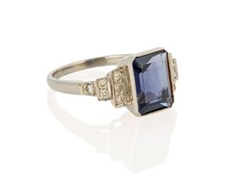 173
An Iolite And Diamond Ring
18k white gold; Stamped: 750
Centering a bezel set rectangular step-cut iolite gauged at 10.7mm x 8.5mm x 4.7mm weighing approximately 2.75cts. further set with three rows of twelve round full-cut diamonds weighing approximately 0.17ct. in weight and graded K-M (light brown) color and SI clarity (ring size: 7.5)
0.4375" H
4.2 grams
Estimate: $300 - $500