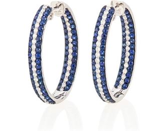 183
A Pair Of Sapphire And Diamond Hoop Earrings
18k white and black gold; Stamped: Afarin / D1.38 / G3.77
Set with one hundred forty-eight round mixed-cut sapphires totaling 3.77cts. in weight and centering seventy-six round full-cut diamonds totaling 1.38cts. in weight and graded G-H color and VS clarity
1.0" W x 1.25" H <br /> 1.0" W x 1.25" H
14.5 grams
2 pieces
Estimate: $4,000 - $6,000