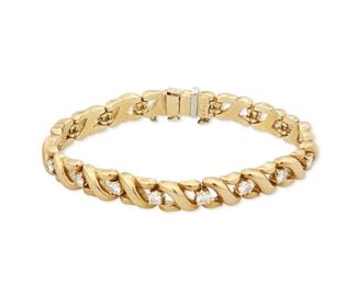 184
A Diamond Bracelet
18k yellow gold; Stamped: 36322
The fancy link bracelet is set with seventeen round full-cut diamonds totaling approximately 1.70cts. in weight and graded G-H color and VS/SI clarity
0.25" W x 6.5" L
39.5 grams
Estimate: $1,000 - $1,500