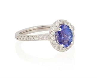 185
A Tanzanite And Diamond Ring
14k white gold; Stamped: 14k
Centering an oval mixed-cut tanzanite gauged at 7.5mm x 5.7mm (closed backing) weighing approximaely 1.30cts. and surrounded by thirty-four round full-cut diamonds totaling approximately 0.35ct. in weight and graded H-I color and SI2/I1 clarity (0.3125" W x 0.375" H)
Ring size: 6.25
3.9 grams
Estimate: $600 - $800
