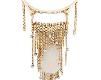 190
An Opal And Diamond Waterfall Necklace
14k yellow and white gold: Stamped: 14k
Centering an oval opal gauged at 23.7mm x 19.1mm x 4.50mm weighing 14.02cts. and accented by nineteen round full-cut diamonds totaling 0.34ct. and graded H-I color and SI clarity further accented by a gold chain tassel waterfall design suspended on an attached neck chain
17.5" L x 3.0" H x 1.0" W
34.9 grams
Estimate: $1,500 - $2,000