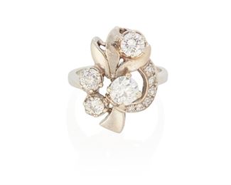192
A Diamond Cluster Ring
14k white gold
An abstract flower ring set with two old mine-cut diamonds totaling approximately 0.45ct. and graded J-K color and VS/SI clarity, one old European-cut diamond gauged at 0.70ct. and graded I-J color and SI clarity, a modern round full-cut diamond gauged at 0.35ct. and graded I-J color and VS clarity and further set with an additional six round single-cut diamonds totaling approximately 0.15ct. (0.625" W x 0.75" H)
Ring size: 7.25
6.7 grams
Estimate: $2,500 - $3,500