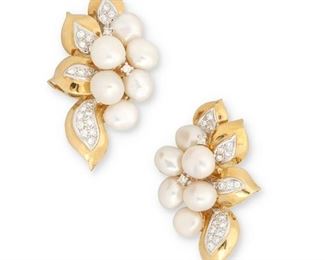 198
A Pair Of Freshwater Pearl And Diamond Ear Clips
18k yellow and white gold; Stamped: 750
The floral ear clips are set with a total of twelve baroque freshwater pearls each gauged at approximately 6mm-8mm further accented with forty-two round full-cut diamonds totaling approximately 1.00ct. in weight and graded G-H color and VS/SI clarity
1.00" W x 1.75" H
30.7 grams
2 pieces
Estimate: $1,800 - $2,500