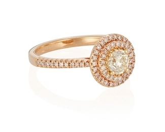 201
A Diamond Ring
18k rose gold; Stamped: D046 / D027 / 18k / Hana
Centering a round full-cut diamond weighing 0.46ct. and graded M+ in color and SI2 clarity surrounded by sixty-eight round full-cut diamonds totaling 0.27ct. in weight and graded H-I color and SI/I clarity (0.375" Dia)
Ring size: 6.5
3.8 grams
Estimate: $600 - $800