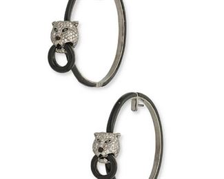 202
A Pair Of Diamond And Enamel Panther Hoop Earrings
18k white gold; Stamped: 750
Pave-set with approximately two hundred-fifty round full-cut diamonds totaling approximately 1.75cts. in weight and graded gray and brown in color and SI/I clarity further set with four black round full-cut diamonds for eyes totaling approximately 0.12ct. set atop black enamel hoop earrings
2.0" W x 1.75" H
20 grams
2 pieces
Estimate: $800 - $1,200