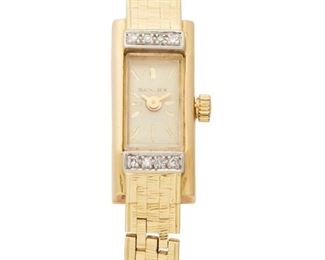 221
A Bucherer Gold Wristwatch
1950's, 18k yellow gold
With a rectangular dial, signed Bucherer with a quartz movement, signed Miyota C. Japan (aftermarket) within an 18k yellow gold rectangular case and integrated link bracelet with bark texture, Hallmarked, diamond bezel
34mm x 11mm; 172mm L
25 grams
Estimate: $700 - $900