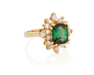 224
A Green Tourmaline And Diamond Ring
14k yellow gold; Stamped: 14k
Centering a fancy cushion mixed-cut green tourmaline gauged at 8.9mm x 8.0mm x 5.5mm weighing approximately 2.70cts. surrounded by a halo of six marquise-cut and ten round full-cut diamonds totaling approximately 0.85ct. in weight and graded H-I color and I1/I2 clarity (ring size: 5.5)
0.625" W x 0.75" H
6.1 grams
Estimate: $1,000 - $1,500