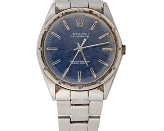 228
A Rolex Oyster Perpetual Wristwatch
1970 <br /> Ref: 1007
A round blue dial with applied chrome baton hour markers, signed Rolex Oyster Perpetual Superlative Chronometer Officially Certified with a Jeweled automatic movement (not examined) within a polished stainless steel case, engine turned bezel, lacking winding crown, stainless steel oyster bracelet, signed Rolex, Serial: 2259467
49mm x 34mm
69 grams
Estimate: $800 - $1,200