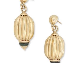 252
A Pair Of Gold And Onyx Earrings
14k yellow gold; Stamped: 14k / Italy / T
Of a fluted barrell design, the earrings terminate with carved faceted onyx
0.75" W x 2.25" H
17.9 grams
2 pieces
Estimate: $500 - $700