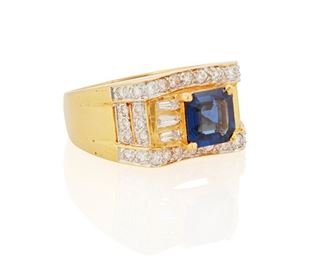 257
A Sapphire And Diamond Ring
18k yellow and white gold
Centering a square step-cut sapphire gauged at 6.9mm x 6.8mm x 2.8mm weighing approximately 1.20cts. further set with six tapered baguette-cut and thirty-four round full-cut diamonds totaling approximately 0.60ct. and each graded G-H color and VS clarity (0.25" H)
Ring size: 8
9.6 grams
Estimate: $1,000 - $1,500