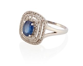 261
A Sapphire And Diamond Ring
14k white gold
Centering an oval mixed-cut sapphire gauged at 7.8mm x 5.9mm x 4.5mm weighing approximately 1.65cts. and further set with a triple halo of eighty-six round single-cut diamonds totaling approximately 0.20ct. in weight and graded H-I color and I clarity (0.50" W x 0.625" H)
Ring size: 8
5.0 grams
Estimate: $400 - $600