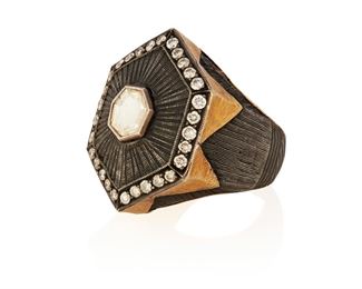 273
An Indian Diamond Hexagonal Ring
Silver and 22k yellow gold
Centering a hexagonal tablet-cut diamond gauged at 7.6mm x 7mm graded L-M color and SI1 surrounded by thirty round full-cut diamonds totaling approximately 0.90ct. in weight and graded light brown in color with SI1-I1 clarity (0.75" W x 1.125" H)
Ring size: 9.5
20.2 grams
Estimate: $800 - $1,200