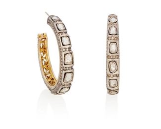 280
A Pair Of Indian Diamond Hoop Earrings
Silver and 14k yellow gold: Posts stamped: 14k
Set with fourteen tablet-cut diamonds largest gauged at approximately 5.5mm x 4.2mm further set with two hundred seventy-four round single-cut diamonds totaling approximately 2.50cts. in weight and graded gray and brown in color and I1/I2 clarity
1.875" Dia
34.1 grams
2 pieces
Estimate: $600 - $800