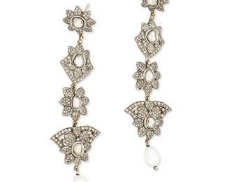284
A Pair Of Indian Diamond And Pearl Foliate Ear Pendants
Silver and 14k yellow gold
Featuring eight tablet-cut diamonds, the largest gauged at 5.2mm x 4.8mm, graded light brown in color and I2 clarity further set with approximately five hundred fifty single-cut diamonds totaling approximately 2.50cts. in weight and graded gray and brown in color and SI2-I2 in clarity each earring terminating with a baroque cultured-pearl gauged at 7.5mm x 9.6mm
1.125" W x 3.75" H
23.2 grams
2 pieces
Estimate: $1,200 - $1,800