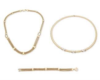 303
A Group Of Gold Jewelry
14k yellow and white gold: Variously stamped: 14k / Italy
Including a tubogas necklace featuring three white gold "X" symbols (0.25" W x 17.0" L) and a double to triple strand necklace featuring three "X" symbols (0.375" W x 17.0" L) with a triple strand matching bracelet (0.375" W x 7")
49.7 grams
3 pieces
Estimate: $800 - $1,200