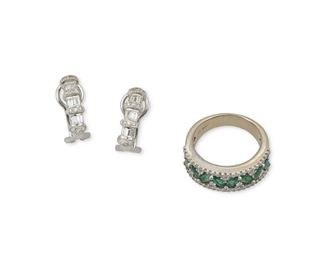 304
Two Diamond Jewelry Items
18k and 14k white gold; Earrings stamped: 750; Ring stamped: 14kt / Wh
Including a pair of 18k white gold and diamond huggie style earrings set with a total of twenty-four round full-cut diamonds and twelve baguette-cut diamonds totaling approximately 0.75ct. in weight and graded H-I color and VS clarity with post and omega clip backings (0.1875" W x 0.75" H) and a 14k white gold ring set with eight marquise-cut emeralds gauged at 4.6mm x 2.6mm accented with thirty-five round full-cut diamonds totaling approximately 0.70ct. and graded H-J color and SI/I clarity (0.25" W; ring size: 8)
18k: 5.4 grams; 14k: 8.0 grams
3 pieces
Estimate: $600 - $800
