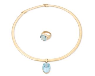 307
A Group Of Blue Topaz Jewelry
14k yellow gold; Stamped: 14k; Variously stamped: Italy / AND
Including a detachable pendant centering an oval mixed-cut blue topaz gauged at 20mm x 15mm x 10.5mm topped with a round full-cut diamond gauged at approximately 0.05ct. suspended on a flat link necklace (0.25" W x 15.0" L) with an additional length extension panel (0.25" W x 2.0" L) and a ring centering a bezel set fancy-cut round blue topaz gauged at 14.6mm x 7.9mm (ring size: 6.75)
51.9 grams
4 pieces
Estimate: $1,200 - $1,800