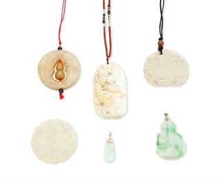 316
A Group Of Six Jade Pendants
Including three carved jade pendants on thread cord necklaces (largest: 1.5" W x 2.875" H ), one carved translucent circular jade (2.0" Dia), a carved mottled green jade pendant on a metal bail (1.375" W x 2.375" H) and a small carved green jade pendant on a 14k yellow gold bail (0.50" W x 1.375" H)
6 pieces
Estimate: $600 - $800