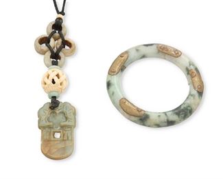 318
Two Jade Items
Including an ornamental jade pendant necklace featuring jade beads, a carved white stone and suspending a carved jade pendant (1.0" W x 1.875" H) on an attached black cord necklace (41.0" L) and a broken jade bangle gauged at 11.6mm wide held together by eight metal plaques and rivets (7.5" Cir)
2 pieces
Estimate: $600 - $800