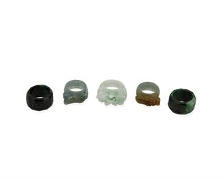 323
Five Carved Jade Rings
Including five jade rings of various colors, widths and designs
Ring sizes: 9.75 & 10.25
Widest band: 0.625" W
5 pieces
Estimate: $100 - $200