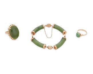 324
A Group Of Jade Jewelry
14k yellow and rose gold; Each stamped; 14k
Including a ring centering an oval cabochon nephrite gauged at 25mm x 18.1mm x 4.6mm (0.75" W x 1.125" H"; ring size: 8.25), a ring centering an oval cabochon jade gauged at 10.1mm x 8.1mm x 2.6mm (0.25" W x 0.375" H; ring size: 6.75) and a bracelet designed with four carved nephrite links alternating with circular gold links (0.25" W x 6.5" Cir)
33.8 grams
3 pieces
Estimate: $400 - $600