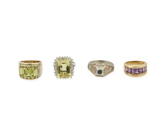 327
A Group Of Four Gemstone Rings
18k and 14k yellow and white gold; Variously stamped: 18k and 14k
Including a tri-colored 18k gold ring centering a round mixed-cut sapphire gauged at 3.5mm weighing approximately 0.30ct. (0.4375" W; ring size: 10), an 18k yellow gold ring featuring seven channel-set rectangular step-cut amethysts gauged at 5mm x 3.5mm (0.375" W; ring size: 5.75), a 14k yellow gold ring centering three rectangular step-cut peridot each gauged at 8mm x 6.6mm and 7.8mm x 6mm further surrounded by ten round mixed-cut peridot gauged at 3mm in diameter and six round single-cut diamonds totaling approximately 0.03ct. in weight (0.50" W; ring size: 7) and a 14k white gold ring centering a rectangular step-cut lemon quartz gauged at 15.8mm x 12.0mm x 8.0mm surrounded by twenty-six round full-cut diamonds totaling approximately 0.75ct. in weight and graded I-J color and SI/I clarity (0.625" W x 0.75" H; ring size: 6.5)
18k: 13.5 grams; 14k: 16.8 grams
4 pieces
Estimate: $1,200