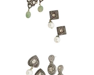328
Four Pairs Of Indian Diamond Earrings
18k white gold, 14k yellow gold and silver
Including a pair of 18k white gold drop earrings featuring four tablet-cut diamonds largest gauged at 6mm x 5.5mm in diameter and further surrounded by small single-cut diamonds (0.375" W x 1.0" H; 6.8 grams), a pair of silver topped 14k yellow gold leaf style drop earrings featuring ten tablet-cut diamonds largest gauged at 4mm x 2.5mm surrounded by small single-cut diamonds, black enamel and terminating with green agate beads gauged at 7mm wide (0.625" W x 1.5" H; 6.8 grams), a pair of silver topped 14k yellow gold teardrop shaped earrings each centering a tablet-cut diamond gauged at 6mm x 4.5mm surrounded by single-cut diamonds, black enamel and terminating with an off-round cultured pearl gauged at 7.7mm (0.625" W x 1.0" H; 7.4 grams) and a pair of silver topped 14k yellow gold diamond shaped earrings each set with a tablet-cut diamond gauged at 4.4mm in diameter and surrounded by small single-cut