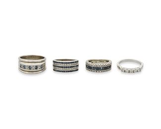 337
A Group Of Four Sapphire And Diamond Bands
14k white gold; Variously stamped: 14k
A group of four 14k white gold bands including a band set with five rectangular step-cut sapphires totaling approximately 0.25ct. in weight and sixteen round full-cut diamonds totaling approximately 0.20ct. in weight and graded I-J color and I clarity (0.4375" W; ring size: 8), a ring centering five round full-cut diamonds totaling approximately 0.50ct. in weight and graded I-J color and SI/I clarity (ring size: 7), a band centering two rows of twenty-six round single-cut diamonds totaling approximately 0.10ct. in weight and graded I-J color and SI/I clarity flanked on either side by three rows of fifty-one calibre-cut sapphires totaling approximately 1.25cts. in combined weight (0.375" W; Ring size: 8) and a band set with ten calibre-cut sapphires totaling approximately 1.50cts. in weight and twenty-six single-cut diamonds totaling approximately 0.08ct. in weight (0.25" W; ring size: 4.5)
21.0 grams
