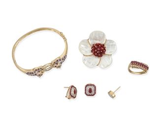 345
A Group Of Ruby And Diamond Jewelry
18k and 14k yellow and white gold: Brooch stamped: 18k / Italy; Variously stamped: 14k / 585
Including an 18k yellow gold flower brooch comprising of mother-of-pearl petals and centering a cluster of faceted ruby beads (1.75" W x 1.50" H, 15.9 grams) and a group of 14k yellow gold jewelry including a hinged bangle bracelet featuring two panthers set with forty-eight round mixed-cut rubies and ten round single-cut diamonds (0.50" W x 6.5" Cir), a pair of earrings centering two oval mixed-cut rubies each gauged at 5.75mm x 3.75mm set with eight small round single-cut diamonds and thirty-six round mixed-cut rubies with post and omega clip backings (0.50" Dia) and a ring set with ten baguette-cut rubies and ten round full-cut diamonds totaling 0.25ct. and graded I-J color and SI clarity (ring size: 6.75, 0.25" H)
14k: 25.6 grams
5 pieces
Estimate: $600 - $800