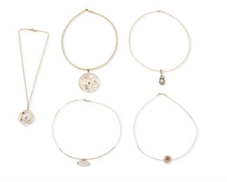 346
A Group Of Five Gemstone Pendant Necklaces
18k and 14k yellow and white gold; Various stamps include: 14k / Italy / Germany / SSS / 750 / Croatia
A group of gemstone pendant necklaces including a 14k yellow gold circle pendant centering a round fancy-cut citrine gauged at 7.2mm surrounded by a halo of twenty-two round full-cut diamonds totaling approximately 0.30ct. and graded I-J color and SI clarity (0.50" Dia) on an attached flat 18k yellow gold necklace (16.0" L; 14.8 grams) and a group of 14k yellow gold jewelry including a pendant centering a bezel set oval moonstone gauged at 22.5mm x 8.1mm (1.0" W x 0.625" H) suspended from a detachable flat necklace (16.0" L), a pendant suspending a baroque Tahitian pearl gauged at 12.3mm wide and topped with carved opal inlay (0.50" W x 1.375" H) suspended on a detachable flat necklace (17" L), a stylized swirl pendant featuring faceted pink tourmaline, peridot, amethyst and citrine beads each gauged at approximately 3.6mm - 4.0mm (1.375"
