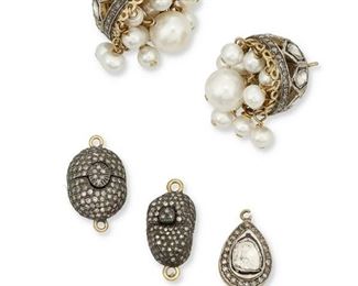 347
A Group Of Indian Diamond Jewelry
14k yellow gold and silver
Including a pair of matching 14k yellow gold and silver pendants each featuring eight tablet-cut diamonds gauged at 5mm x 4mm surrounded by small single-cut diamonds, black enamel and each terminating with a cluster of off-round and baroque cultured pearls gauged at 4.7mm and 8.9mm (0.75" W x 1.0" H), a silver and 14k yellow gold pear shaped pendant centering a tablet-cut diamond gauged at 6mm x 5.3mm and surrounded by small single-cut diamonds and black enamel (0.50" W x 0.75" H) and two bean shaped silver and 14k yellow gold clasps pave-set with small single-cut diamonds (largest; 0.50" W x 0.875" H)
Pendants: 19.2 grams; Clasps: 8.4 grams
5 pieces
Estimate: $700 - $900