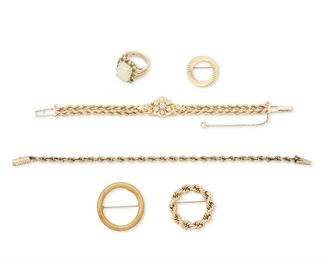 350
A Group Of Jewelry
18k and 14k yellow gold; Each stamped: 18k / 14k
Including an 18k yellow gold circle brooch with a Florentine finish (1.25" Dia, 5.3 grams) and a group of 14k yellow gold jewelry including a covered watch designed by Cordova topped with nine round opals ranging in diameter from 3mm - 4.5mm (0.625" W x 7.0"), a twisted rope style bracelet (0.1875" W x 8.5" L), a twisted rope style circle brooch (1.25" Dia), a crescent moon motif circle brooch (1.0" Dia) and a ring centering a cushion-cut cabochon opal gauged at 15.5mm x 12mm x 5.3mm accented by eleven alternating round mixed-cut emeralds and eleven round full-cut diamonds totaling approximately 0.50ct. in weight and graded H-I color and SI clarity (0.625" W x 0.75" H, ring size: 8.25)
14k jewelry: 35.8 grams; 14k watch: 33.4 grams
6 pieces
Estimate: $2,500 - $3,500