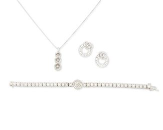 358
A Group Of Diamond Jewelry
14k white gold and sterling silver; Variously stamped: 14k / 585 / 925
Including a 14k white gold diamond bracelet set with sixty round full-cut diamonds and one marquise-cut diamond totaling approximately 2.00cts. in weight and graded I-K color and SI2/I1 clarity (0.50" W x 6.25" L), a pair of 14k white gold swirl earrings set with two hundred two round full-cut diamonds totaling approximately 2.00cts. in weight and graded I-J color and I1 clarity with post and push backings (0.625" Dia) and a sterling silver infinity pendant set with eighteen round full-cut diamonds totaling approximately 0.10ct. in weight (0.25" W x 1.125" H) suspended on a sterling silver neck chain (18.0" L)
14k white gold: 20.0 grams; Silver: 4.1 grams
5 pieces
Estimate: $600 - $800