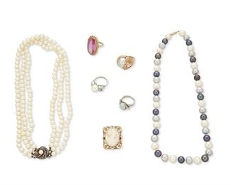 359
A Group Of Jewelry
14k, 10k yellow and white gold and sterling silver; Variously stamped: 14k / 10k / 925
Including a 14k yellow gold ring centering a bezel set oval-mixed cut synthetic pink sapphire gauged at 23mm x 12.6mm x 7.1mm surrounded by small seed pearls (0.625" W x 1.125" H; ring size: 5.5), a 14k yellow gold ring centering a silver baroque cultured pearl gauged at 15.5mm x 11.15mm (0.75" Dia; ring size: 6), a 14k white gold ring centering a round cultured pearl gauged at 10.2mm flanked by four baguette-cut and two round full-cut diamonds totaling approximately 0.55ct. in weight and graded I-J color and SI clarity (0.375" H; ring size: 5), a necklace featuring multicolored baroque cultured pearls each gauged at 8.9mm - 9.7mm with a 14k yellow gold clasp (18.5" L), a 10k yellow gold shell cameo and seed pearl brooch (1.0" W x 1.125" H), a 10k white gold ring centering an oval white opal gauged at 12mm x 8.6mm flanked by ten round full-cut diamonds totaling approximately 0.