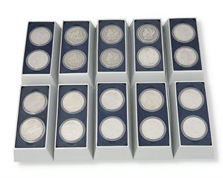 368
A Group Of Twenty U.S. Silver Dollars
Two coins cased and fitted in presentation box per year including
2-1880, 2-1889, 2-1890, 2-1900, 2-1921, 2-1922, 2-1923, 2-1924, 2-1925, 2-1926
20 pieces
Estimate: $500 - $700