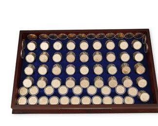 369
A Group Of US Presidential $1 Coins
Danbury Mint
37 rolls, each roll containing 12 coins, sealed and uncirculated
36 dollar coins each under plastic
Presidential coins include, George Washington, James Polk, Thomas Jefferson, James Buchanan, John Adams, George H.W. Bush, Ulysses S. Grant, John F. Kennedy, Theodore Roosevelt, and many more.


480 coins total
Estimate: $400 - $600