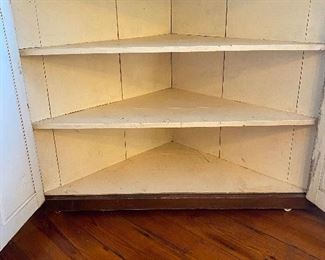 $650. (F5) Antique Corner Cabinet out of Fayetteville NC. LARGE! Comes out 36" from the corner at the widest part. Steps back to 29" for the display top part. 7' tall.  Shelves are not adjustable. Solid - in great condition!