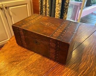 $20. Small wooden display box. Very good condition - minor chips on veneer. Measures 6.5" deep x 10" long  x 4.5" tall. 