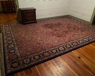 $650. (R2) Large Karastan area rug 10' x 14'. The darker colors are where the bed was that got less wear - less noticeable in person! NOT a dark stain like it looks in this photo. 