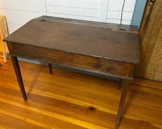 $350. (F13) Antique Primitive Writing Desk - has had minor repair but works great - very sturdy. Measures 43" wide x 24.5" deep x 29" tall at the front x 32.5" tall on the back. 