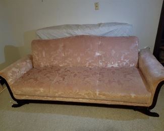 Beautiful footed couch (converts to bed)