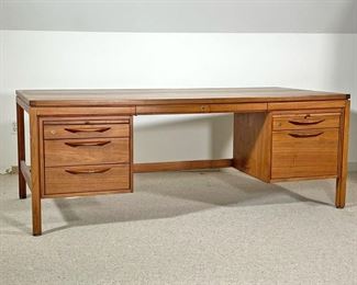 JENS RISOM EXECUTIVE DESK  | 
With two banks of drawers and a central support beam, no plaque or signature
- l. 74 x w. 36 x h. 28 in.