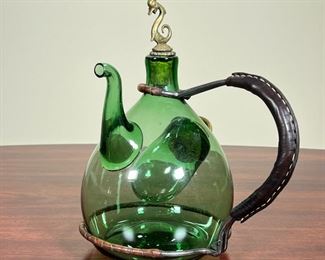 UNUSUAL GREEN GLASS POT  |  
Green Italian pot with a brass and cork stopper - h. 10 1/2 in.