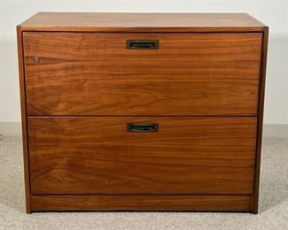Attr. RISOM WALNUT VENEERED FILING CABINET | Attributed to Jens Risom,  two full width drawers with brass pulls, lock with piece of key wedged inside - l. 36 x w. 19 x h. 29 in.