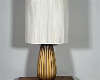BULBOUS CERAMIC LAMP  | 
Gadrooned pattern ceramic on a turned wood base no apparent signature - h. 36 x dia. 18 in. (Over shade)
