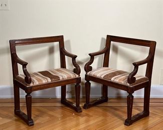 PAIR CARVED BENCHES  |  
Carved wood benches of small size, with armrests and open back, with striped velvet upholstered seats - l. 24.75 x w. 15 x h. 31.5 in. (each)